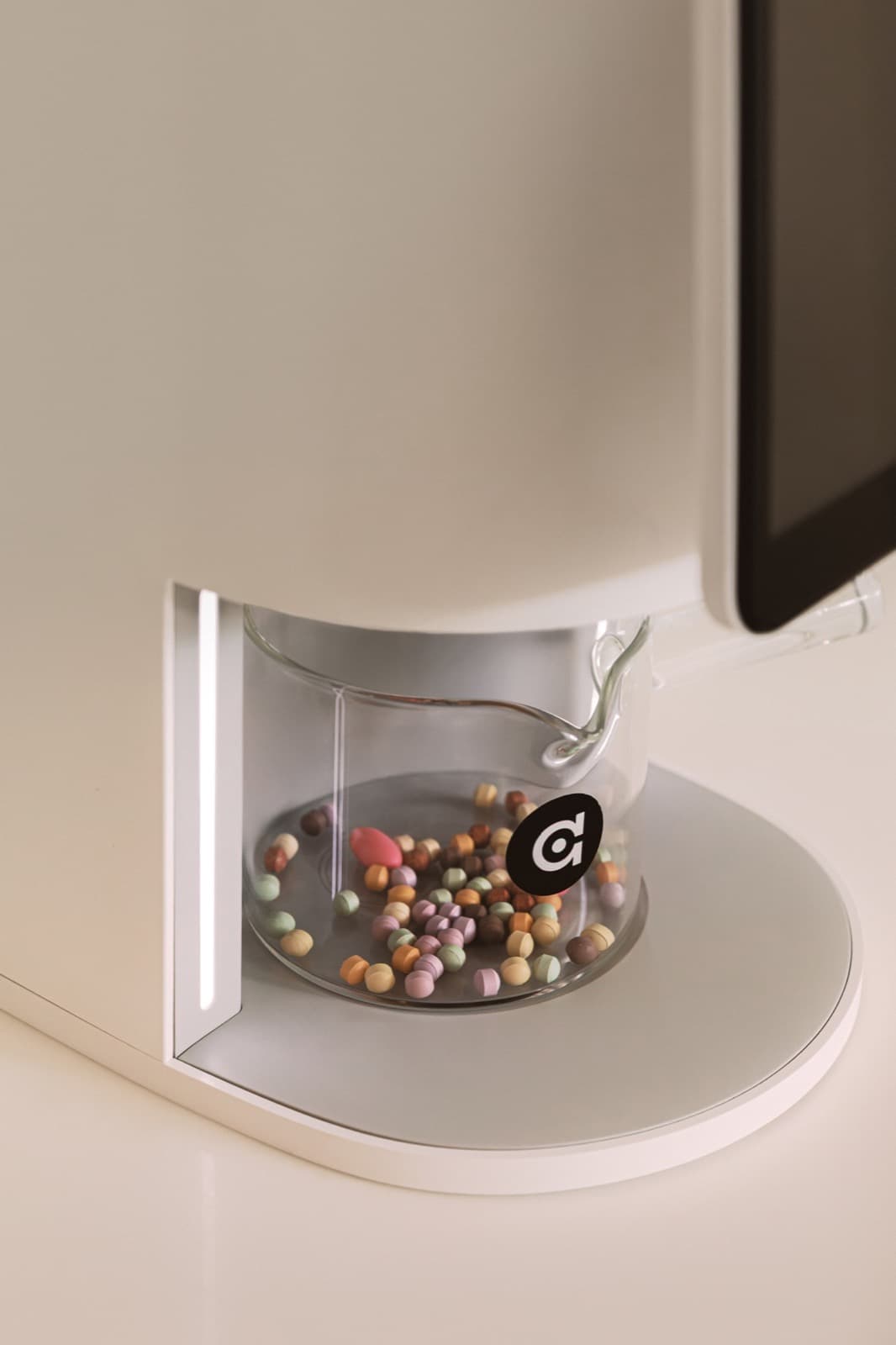 algocare E1 dispenser on a light countertop, recomposited against Moon-50.