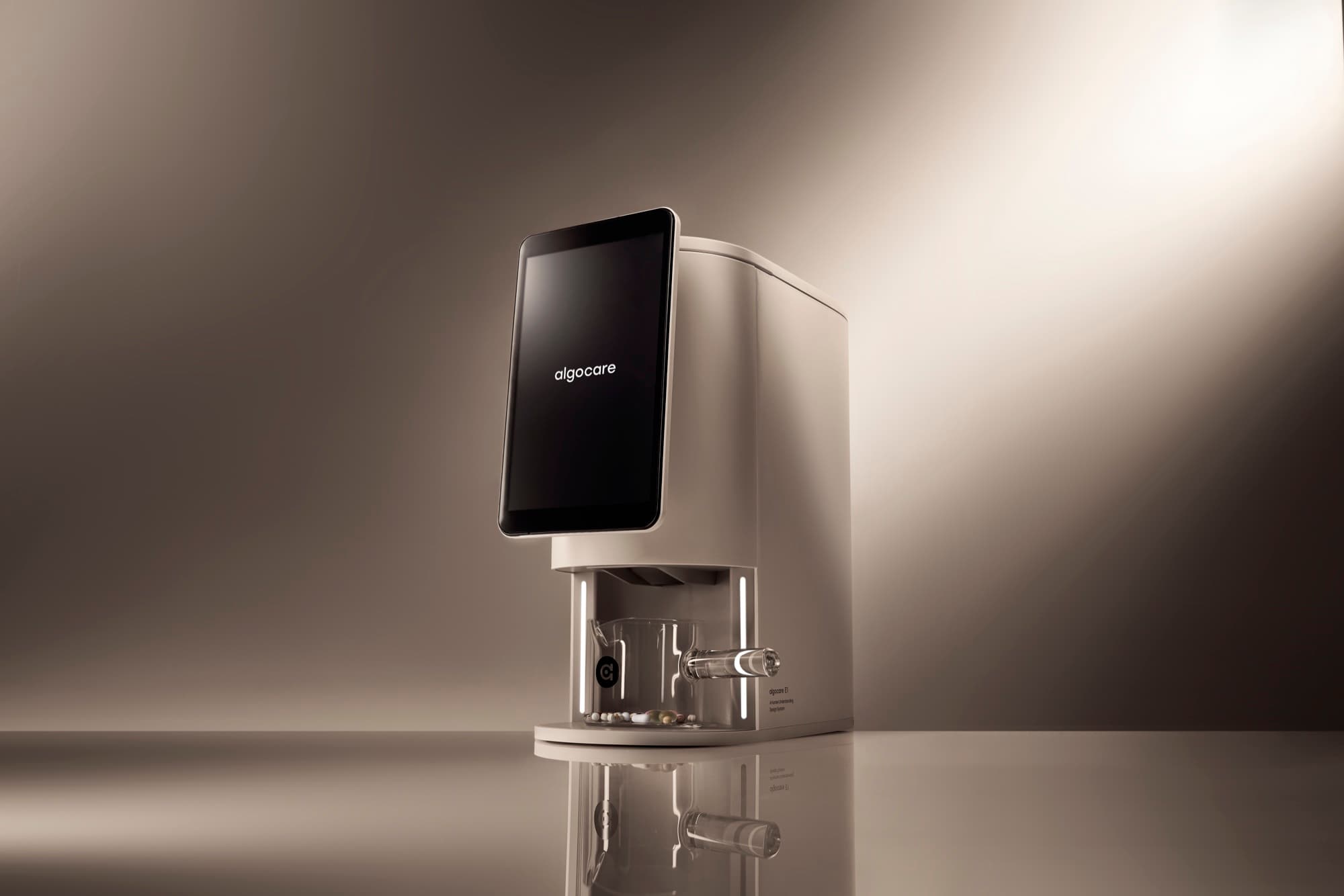 algocare E1 countertop dispenser, studio photograph at 15° angle.